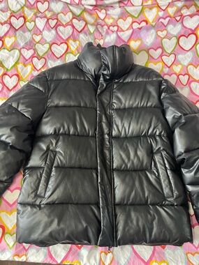 Kanuk black puffer jacket never worn